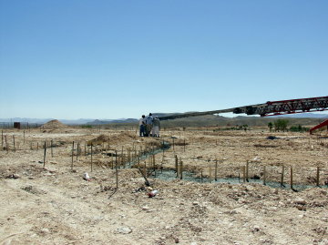 Concrete boomed into place